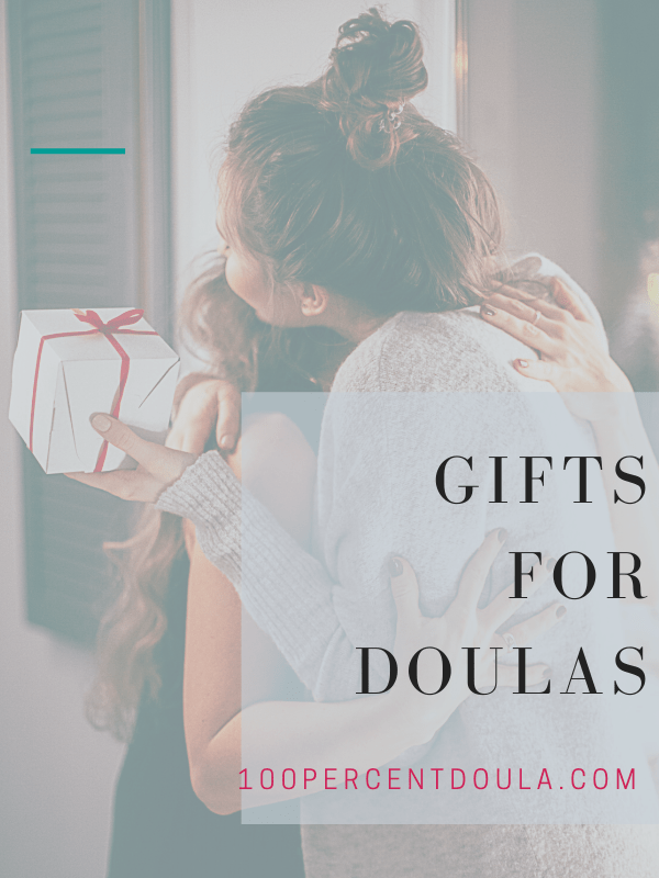 A woman gives a heartwarming hug to another woman, showcasing thoughtful gifts for doulas.